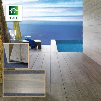 Les carreaux de céramique vitrés de grain en bois glissent non 200x1000mm que les bruns/bronze la couleur