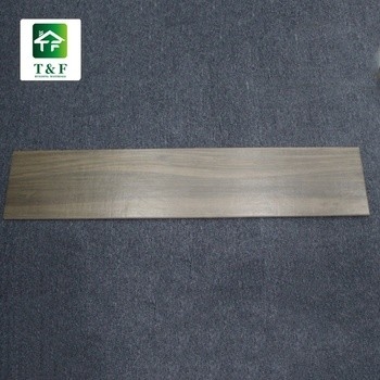 Les carreaux de céramique vitrés de grain en bois glissent non 200x1000mm que les bruns/bronze la couleur