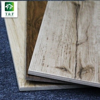 Les carreaux de céramique vitrés de grain en bois glissent non 200x1000mm que les bruns/bronze la couleur